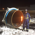 Large diameter pipe cut by night